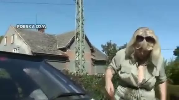 Mother in law helps son in law to wash a car and seduce him with flashing boobs